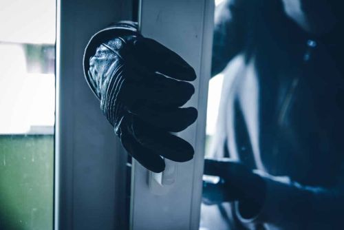 Burglar Breaking Into House concept