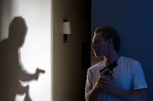 Armed resident ready to protect themselves against robber
